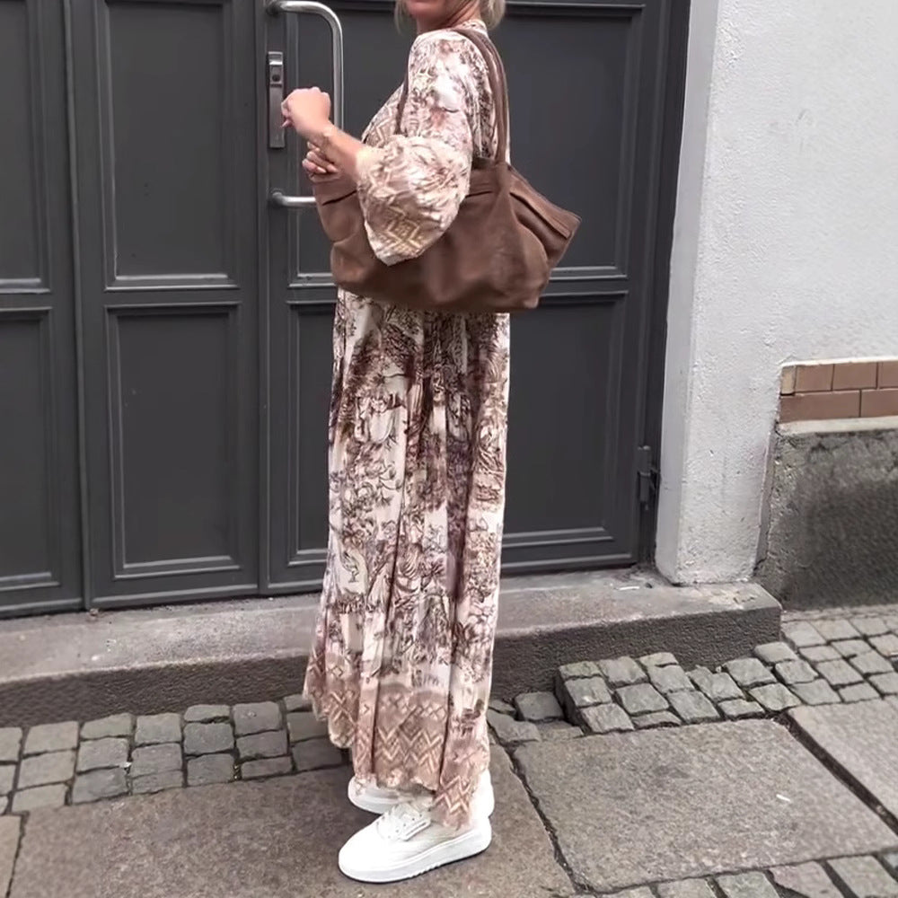 Ladies' tiered maxi dress with ethnic border, stand-up collar, and wide bell sleeves Mune Fashion