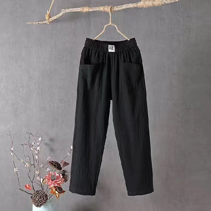 Ladies casual linen blend trousers with elastic waistband, straight leg, and large patch pockets Mune Fashion