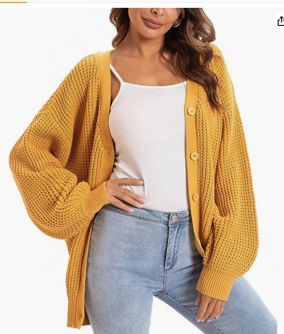 Women nan Oversize knit cardigan with balloon sleeves and generous button placket Mune Fashion