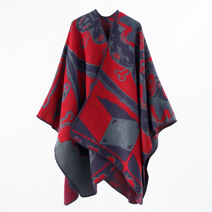 Women's statement cape poncho made from jacquard woven wool blend with skull and bone pattern Mune Fashion