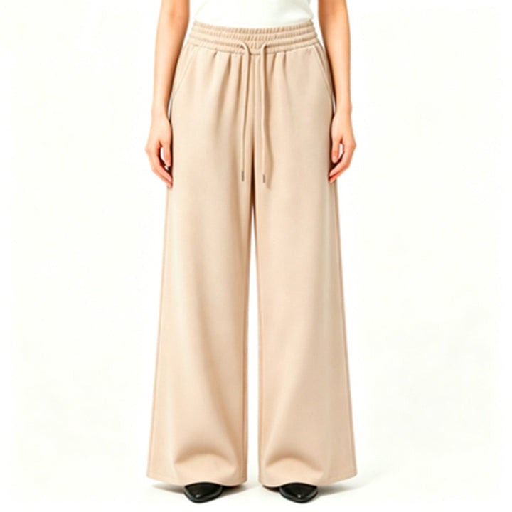 Ladies wide high-waist lounge pants with elastic waistband, drawstring, and flowing jersey Mune Fashion