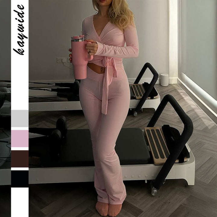 Women’s wrap crop top with knot waistband and high waist bootcut leggings set Mune Fashion