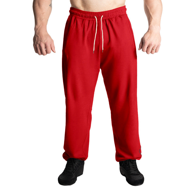 Men's casual jogging pants with elastic drawstring waistband, subtle side stripe, and deep side pockets Mune Fashion