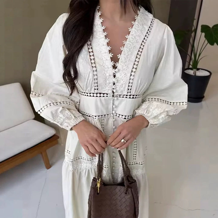 Women's maxi dress in boho style with lace inserts, button placket, and balloon sleeves Mune Fashion