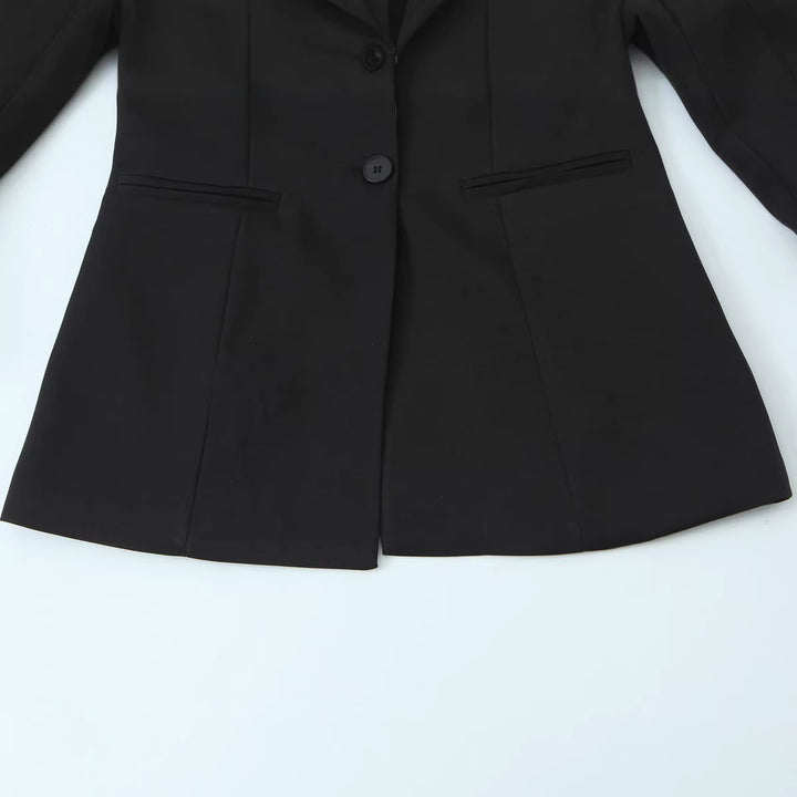 Women's statement blazer with contrasting shawl collar and ruffle cuffs Mune Fashion
