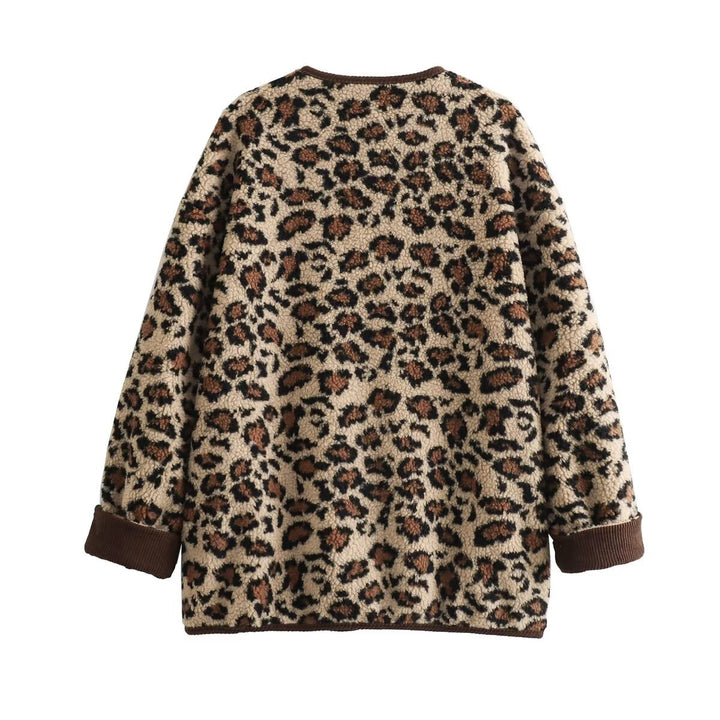 Women’s faux sheepskin jacket with leopard pattern, cord trim, full button placket, and patch pockets Mune Fashion