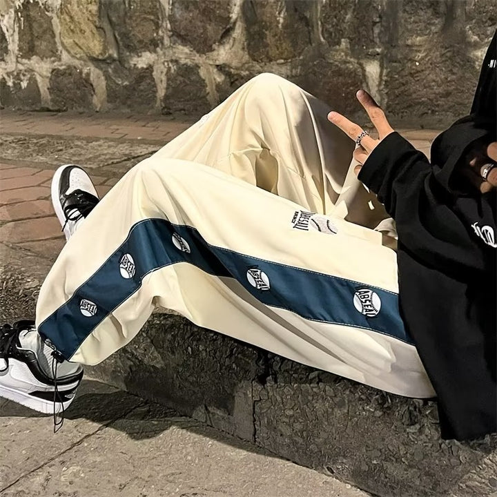 Men's fashionable sports pants with side graphic print Mune Fashion
