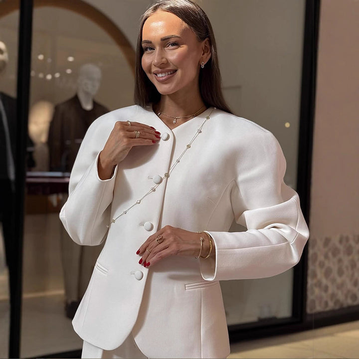 Women Short Blazer with Sculptural Shoulder, Rounded Neckline and Concealed Button Placket Mune Fashion