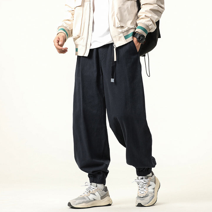 Men's wide relaxed cargo pants in jogger style with elastic tunnel drawstring waistband and cord decoration Drune