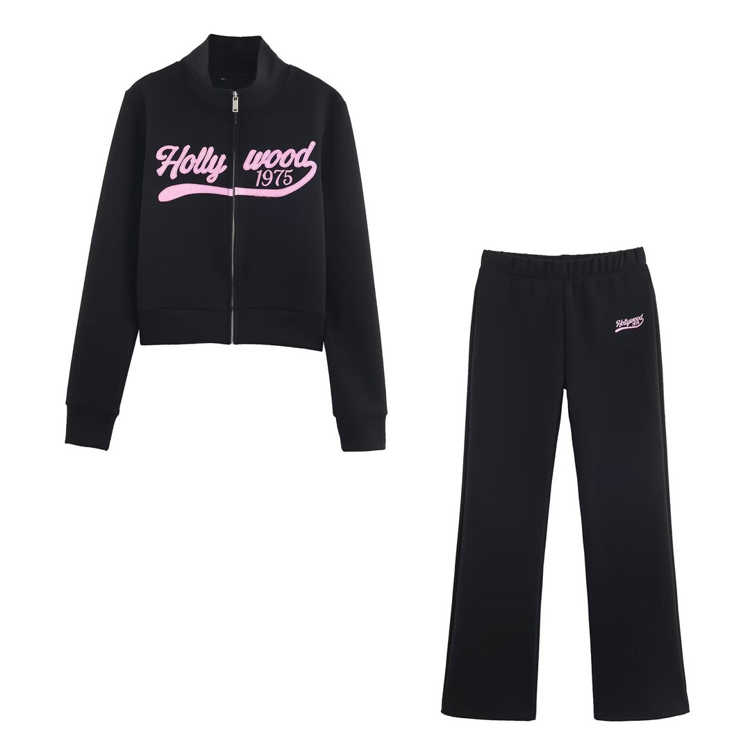 Women's loosely cut jersey casual pants with wide legs, elastic waistband, and retro logo Mune Fashion