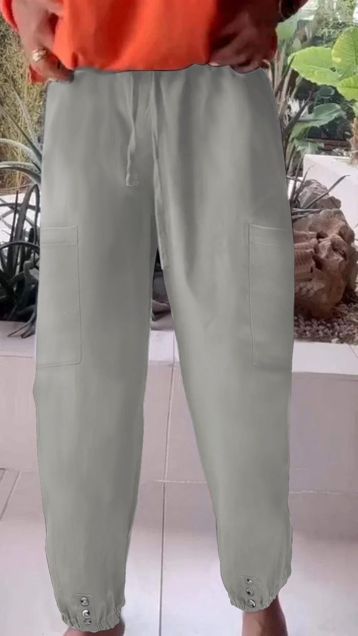 Ladies cargo jogging pants with drawstring, patch pockets and button cuffs Mune Fashion