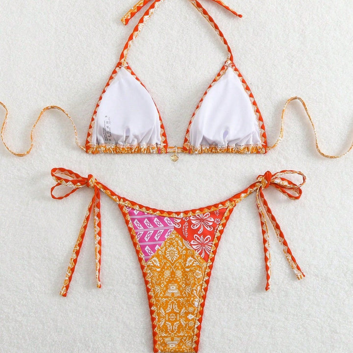 Women's triangle bikini with playful cut and exotic pattern Mune Fashion