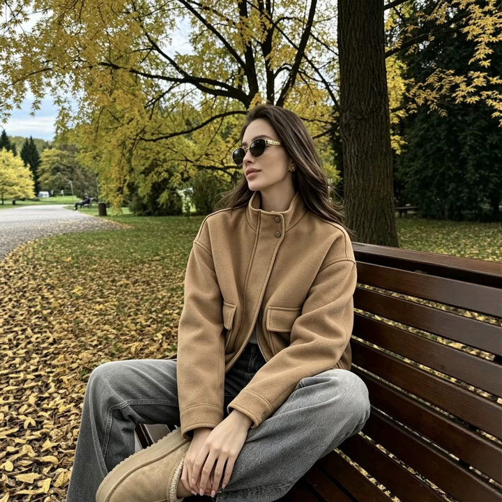 Women's wool blend blouson jacket with stand-up collar, large flap pockets, and elastic hem Mune Fashion