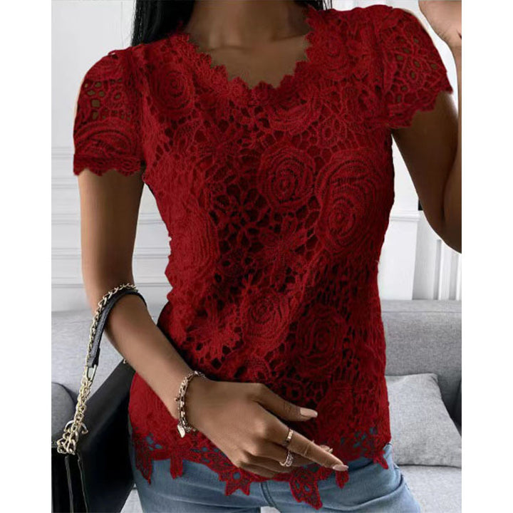 Women's lace top with V-neck, tailored silhouette and romantic wave hem Mune Fashion