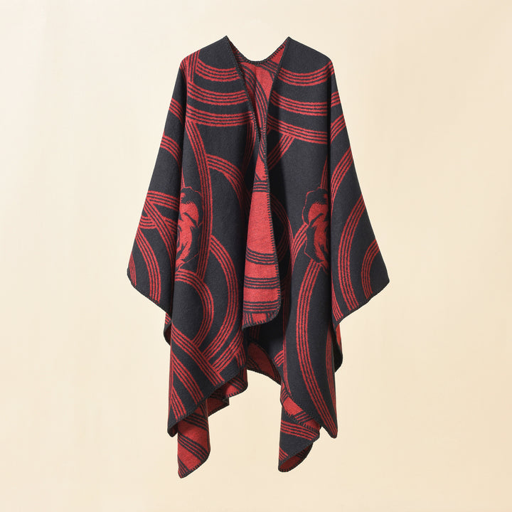 Ladies' collarless jacquard cape in a boxy oversized style with abstract medallion pattern