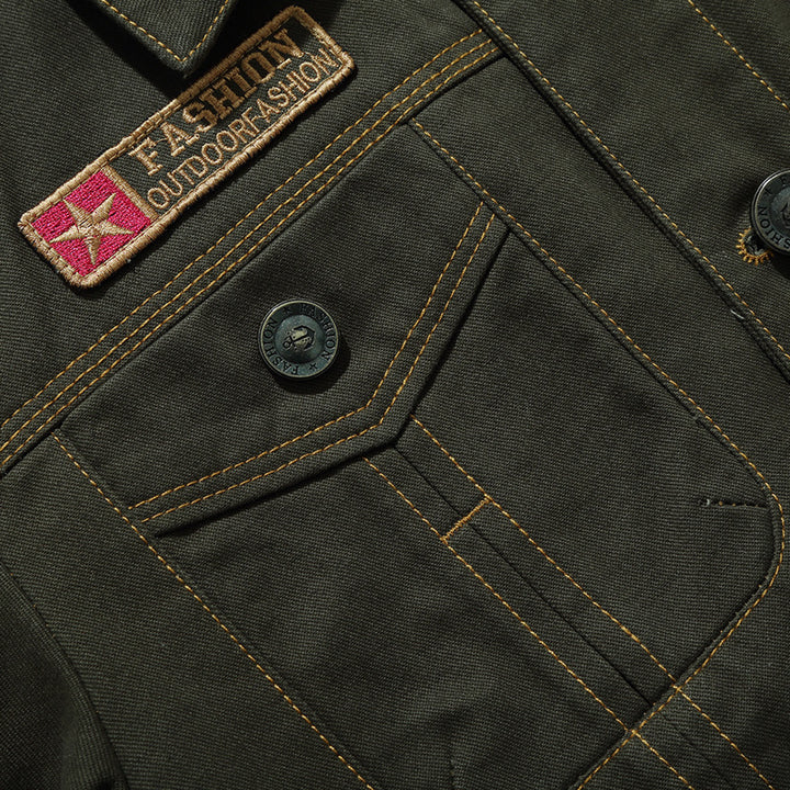 Men's military-inspired canvas field jacket with contrasting decorative seams and breast pockets Mune Fashion