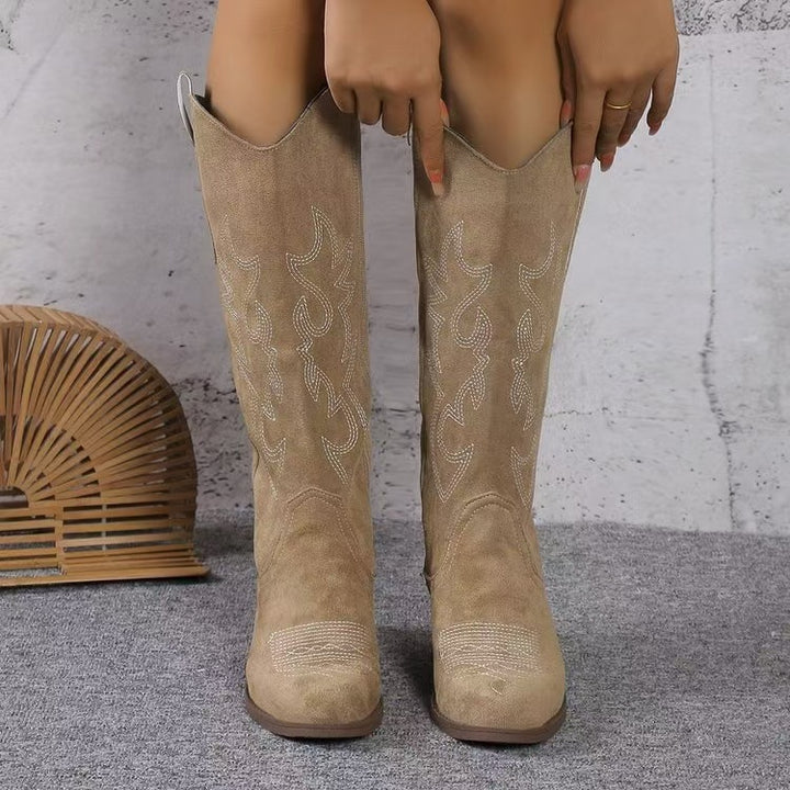 Ladies knee-high boots in western style with mid-high block heel, side zipper, and embroidered suede finish Mune Fashion