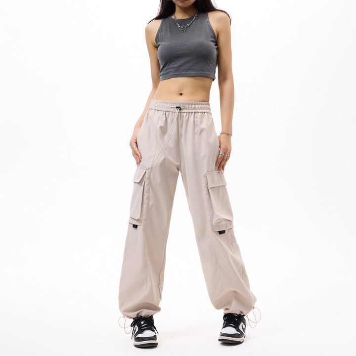 Men's wide utility cargo pants in baggy cut with drawstring waistband, large flap pockets, and adjustable leg hems Drune