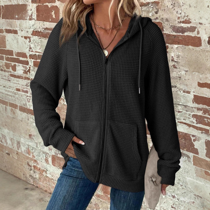 Women's waffle knit hooded jacket with zipper, kangaroo pockets, and relaxed silhouette Mune Fashion