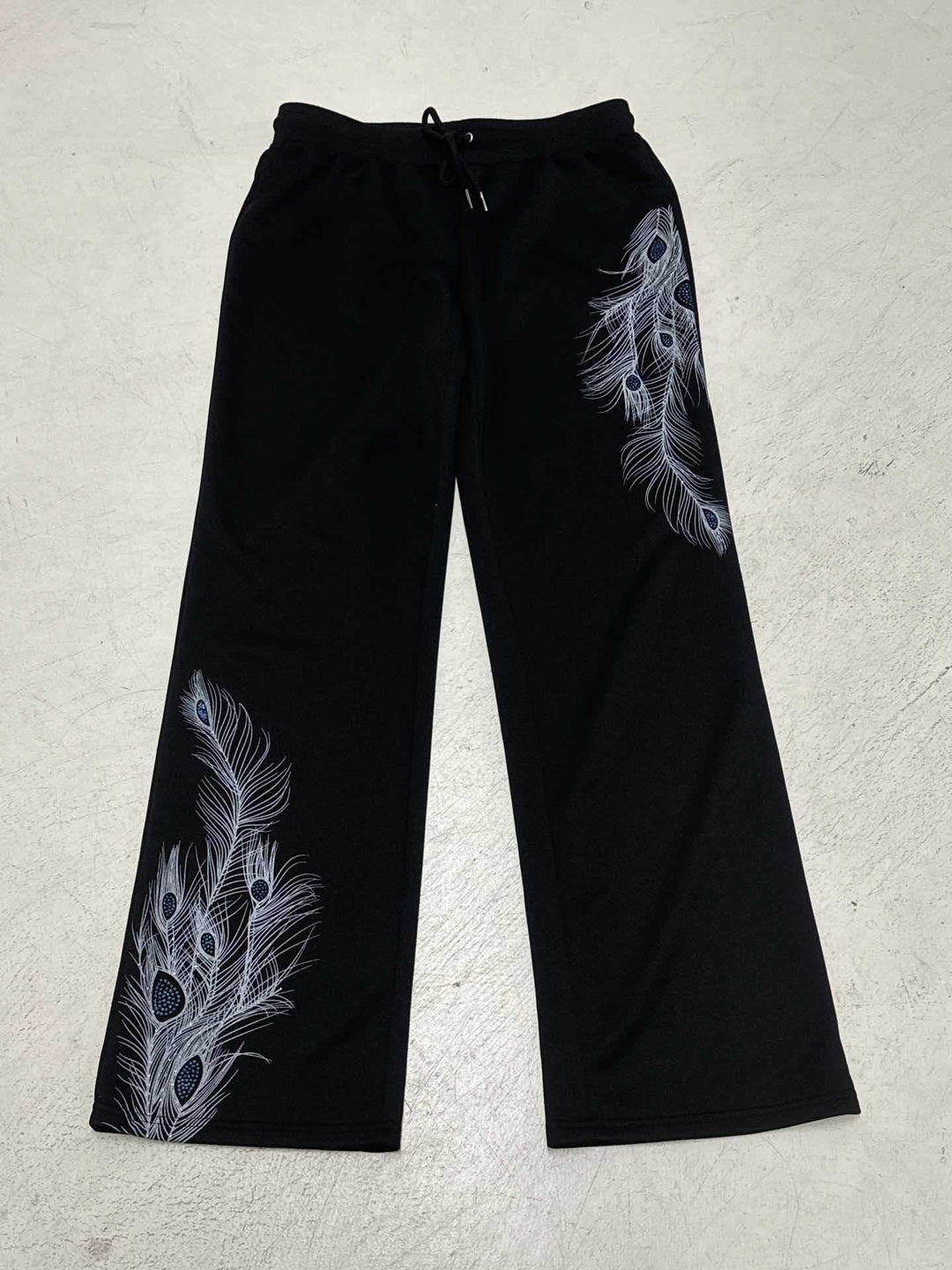 Ladies' wide lounge pants with drawstring, high comfort waistband and peacock feather print Mune Fashion