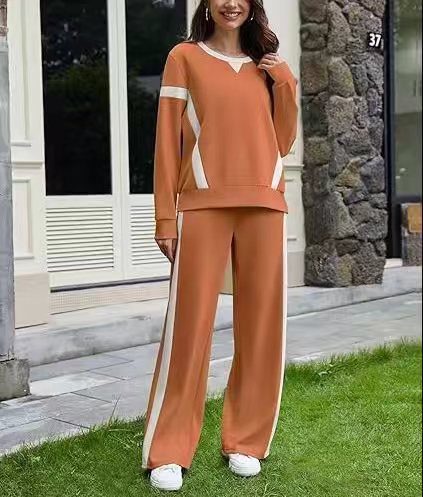 Women nan sports Lounge set with oversized sweatshirt, palazzo pants and side contrast stripes Mune Fashion