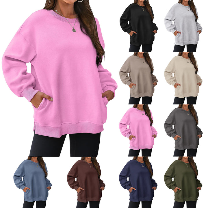 Women's extended oversized round neck sweater with side pockets, ribbed cuffs, and dropped shoulder Mune Fashion
