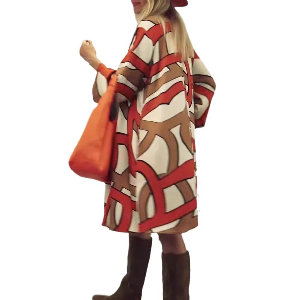 Women's generous swing dress with wide tulip hem, batwing sleeves and graphic all-over pattern Mune Fashion