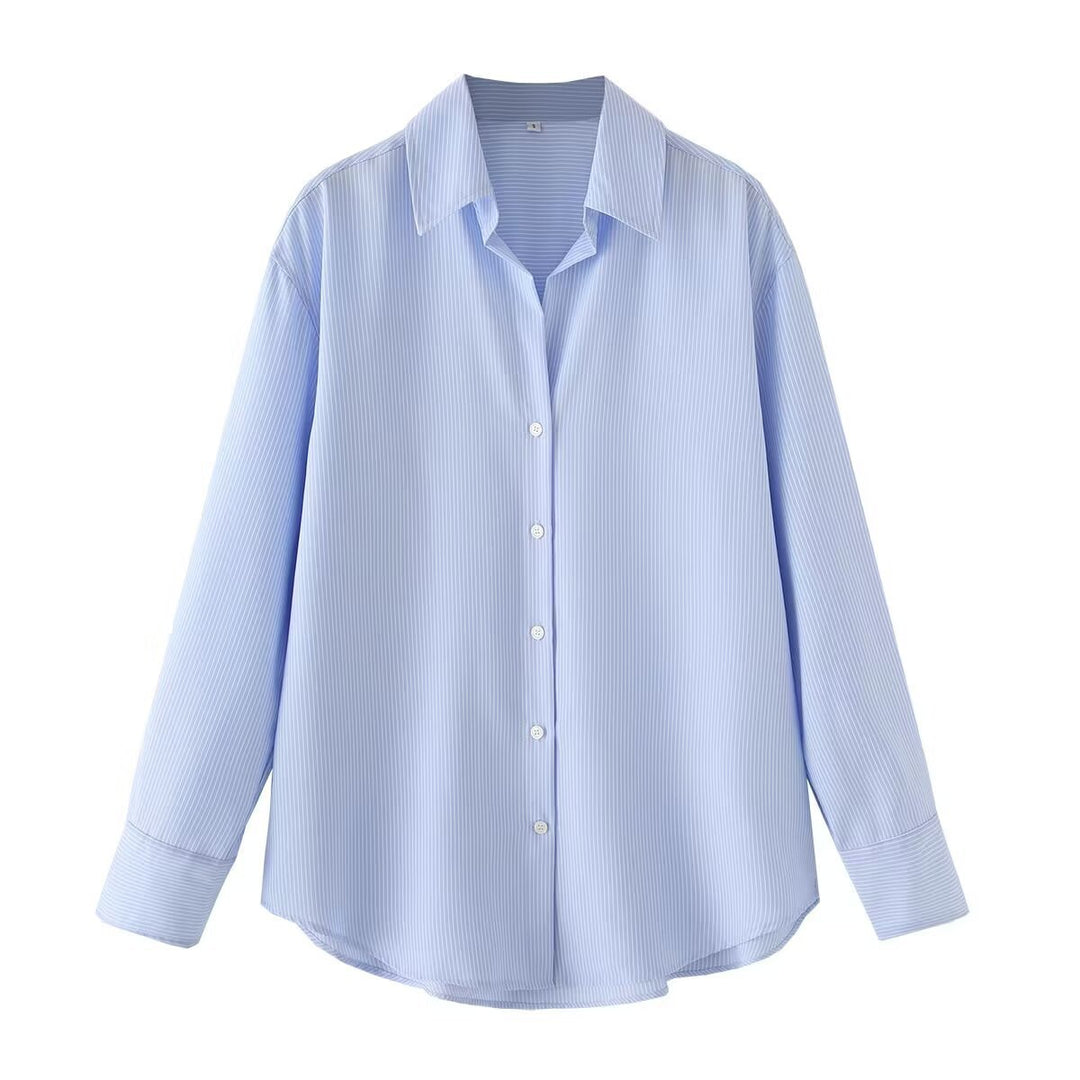 Women's oversized shirt blouse with a wide cut, long cuffed sleeves, and rounded hem Mune Fashion