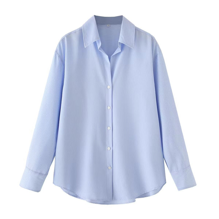 Women's oversized shirt blouse with a wide cut, long cuffed sleeves, and rounded hem Mune Fashion