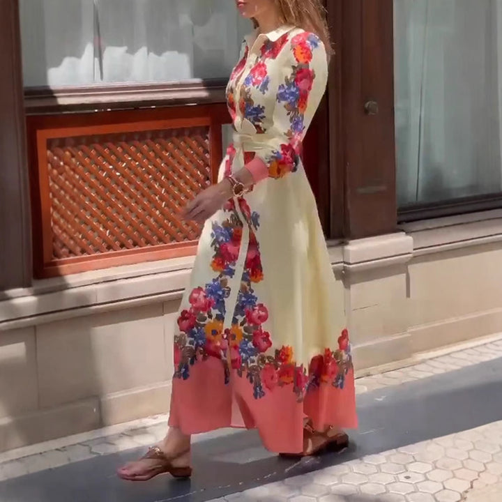 Women's long hem blouse dress with floral print, tie belt, and ruffle trim Mune Fashion
