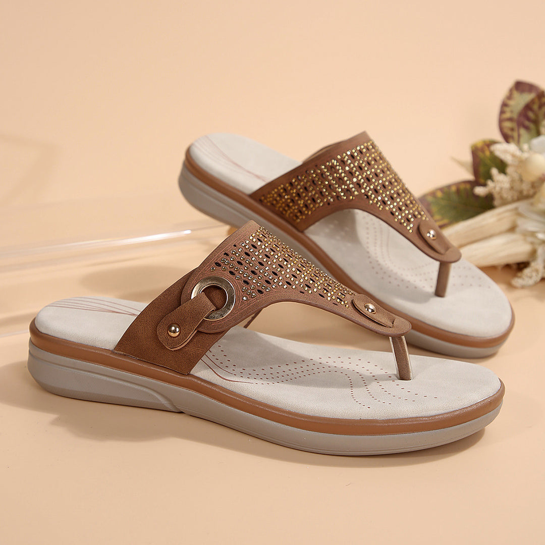 Women's toe-post sandals with viscoelastic comfort footbed, decorative eyelet application, and perforated insole Mune Fashion