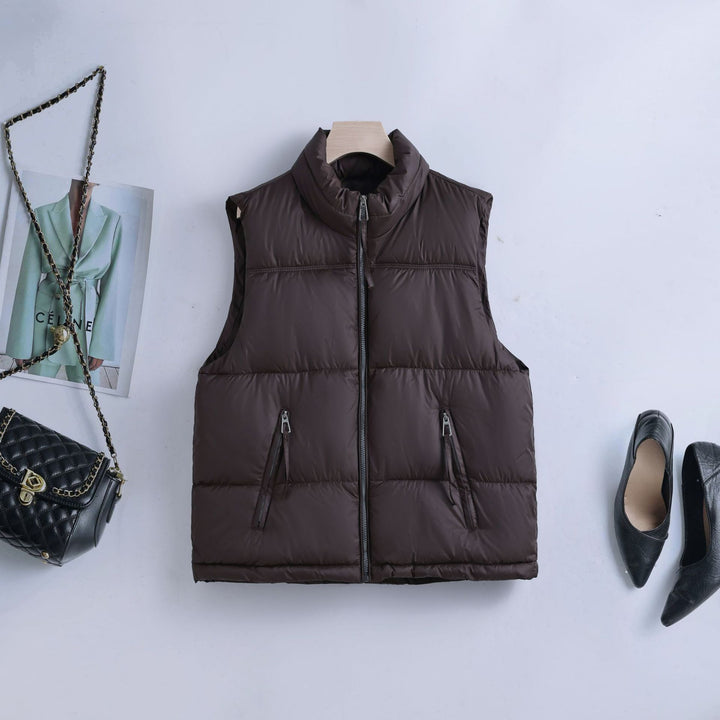Women nan padded quilted vest with high stand-up collar, two-way zipper and concealed zippered pockets Mune Fashion