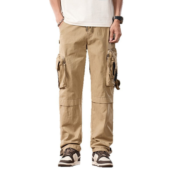 Men's multifunctional cargo pants in utility style with large flap and zip pockets, drawstring closure, and sturdy twill Mune Fashion