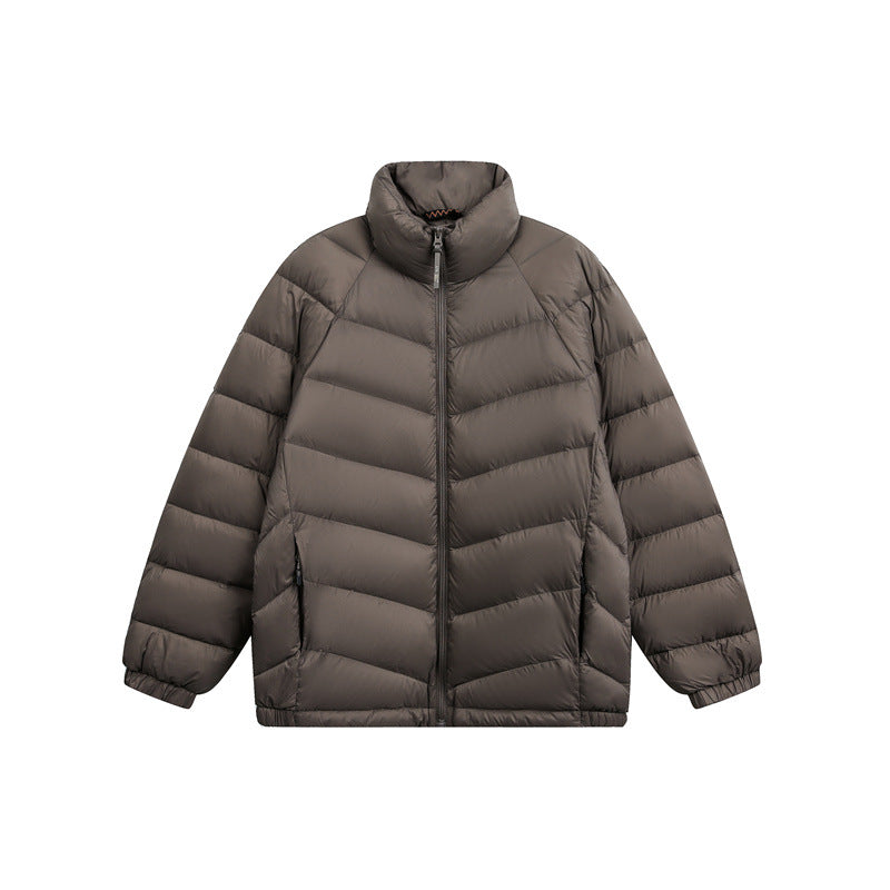 Unisex Short cut padded jacket in boxy fit with chevron quilting and high collar Mune Fashion