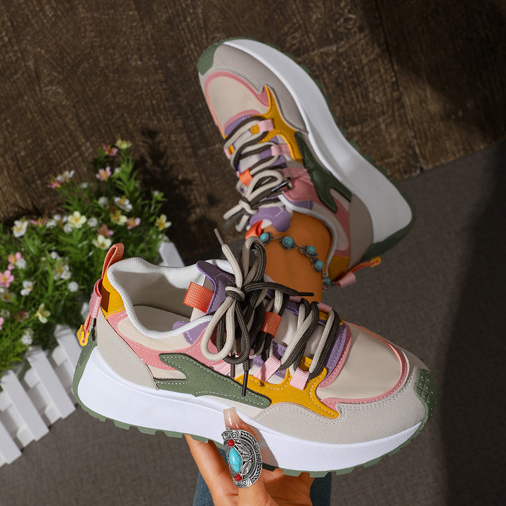 Women’s platform sneaker with layered upper material, padded heel and grippy tread sole Mune Fashion