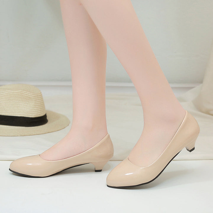 Women's pointed toe pumps in high-gloss patent look with low conical heel, padded comfort insole, and soft lining Mune Fashion