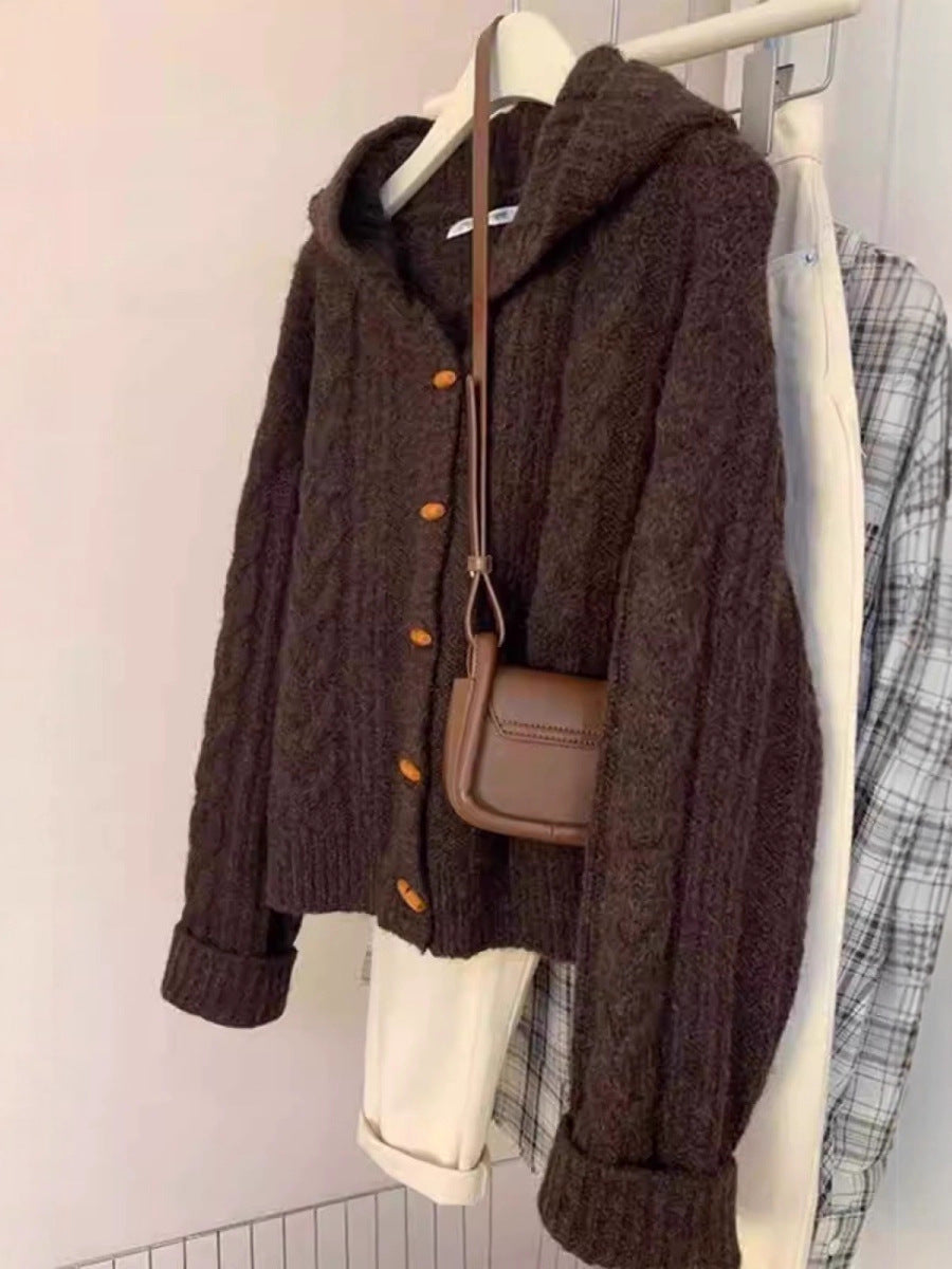 Women's hooded cardigan with cable knit, wooden button placket, and boxy silhouette Mune Fashion