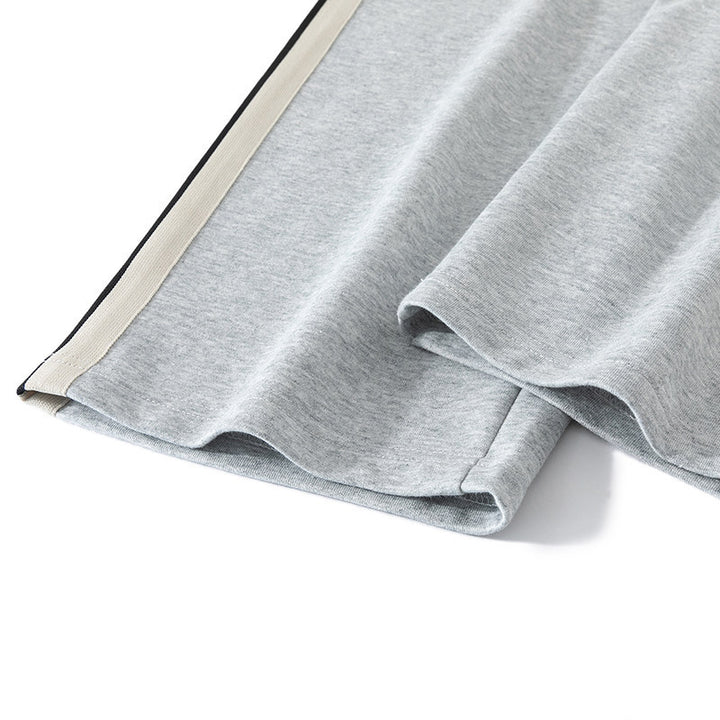 Men's loose-fitting joggers with elastic waistband, drawstring, and contrasting side stripes Mune Fashion