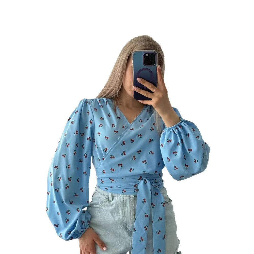 Women's wrap blouse with cherry print, wide puff sleeves & tie belt Mune Fashion