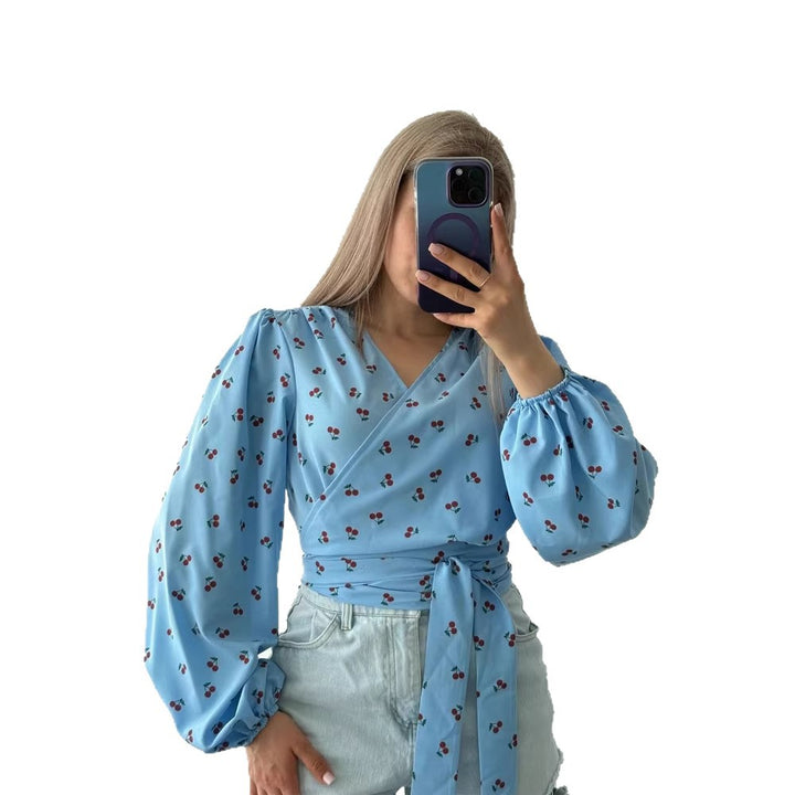Women's wrap blouse with cherry print, wide puff sleeves & tie belt Mune Fashion
