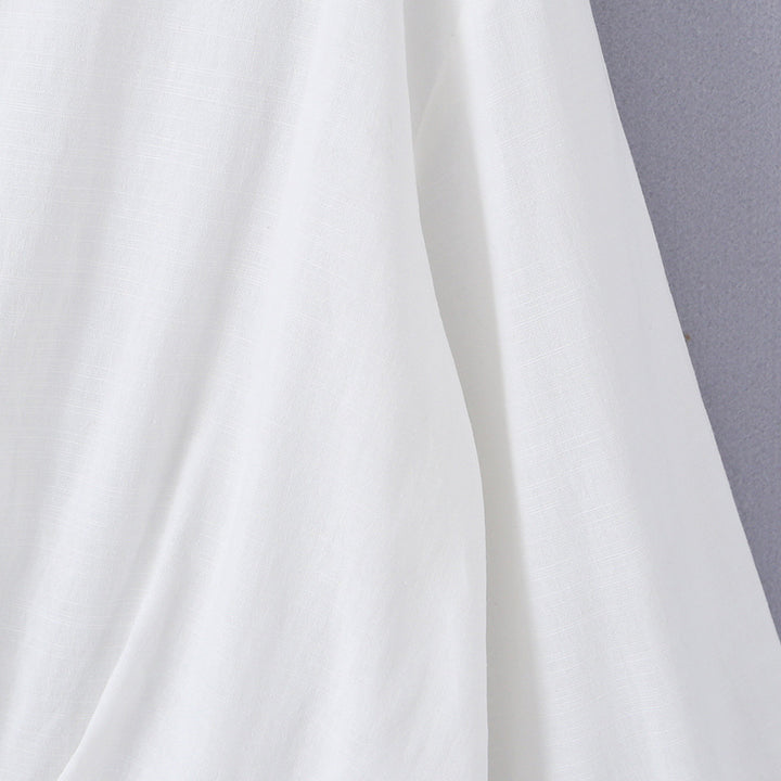 Women's oversized blouse with deep V-neck, shirt collar, and gathered front hem Mune Fashion