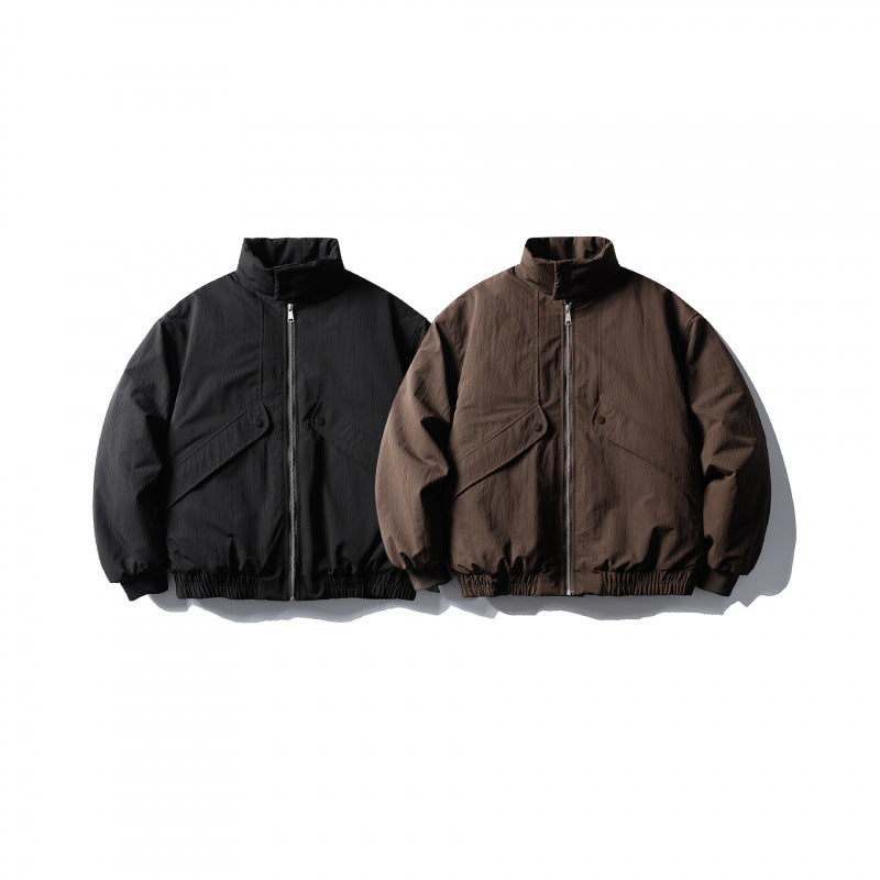 Unisex short boxy isolation jacket with diagonal flap pocket detail and elastic hem Mune Fashion
