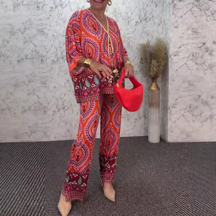 Ladies relaxed tunic and palazzo pants set with V-neck fringe band and wide leg Mune Fashion
