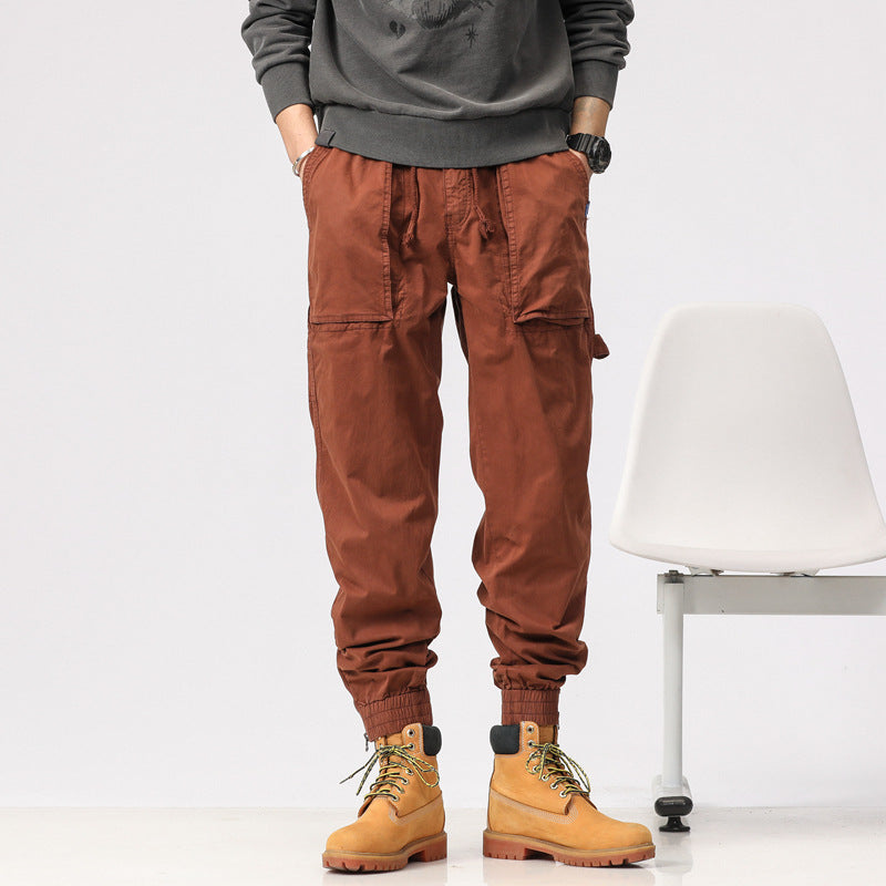 Men's workwear cargo pants in tech jogger style with applied front pockets, hammer loop, and ankle zippers Drune