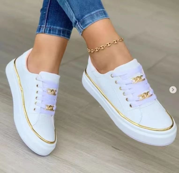 Women's platform sneaker with gold decorative edging and jewelry chain details Mune Fashion