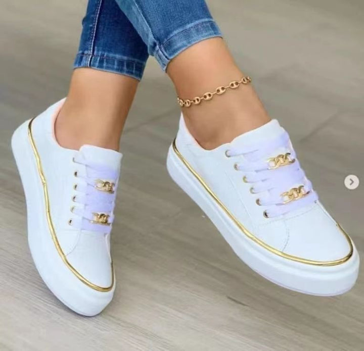 Women's platform sneaker with gold decorative edging and jewelry chain details Mune Fashion