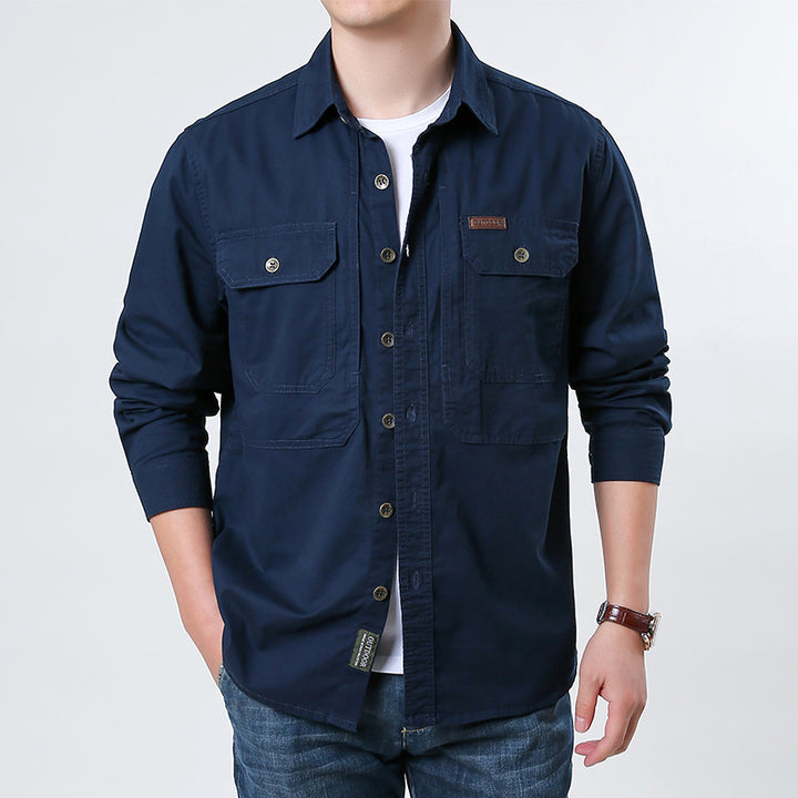 Men's casual utility shirt jacket made of cotton twill with two patch breast pockets and buttonable front.