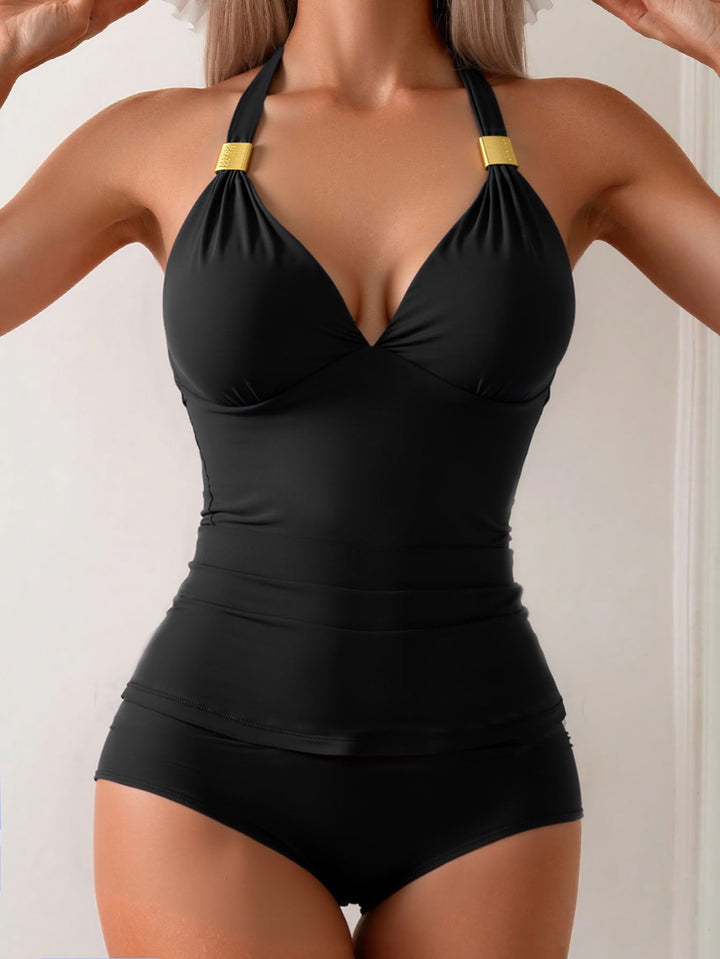 Ladies elegant swimsuit with sophisticated V-neck and golden details Mune Fashion