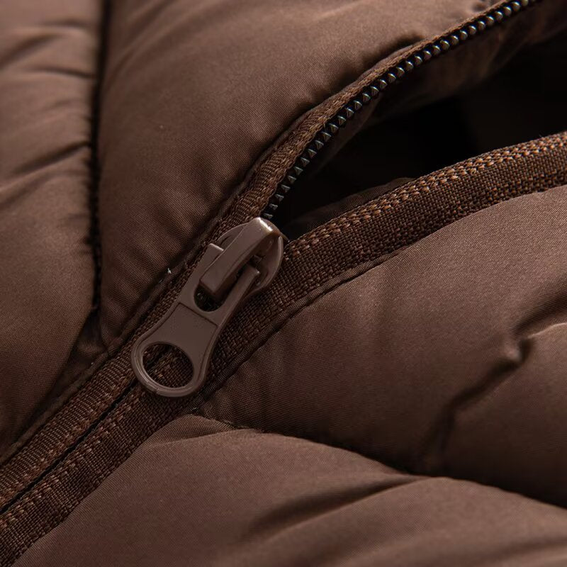 Women's hybrid quilted jacket with padding, hood, and elastic sleeve inserts Mune Fashion