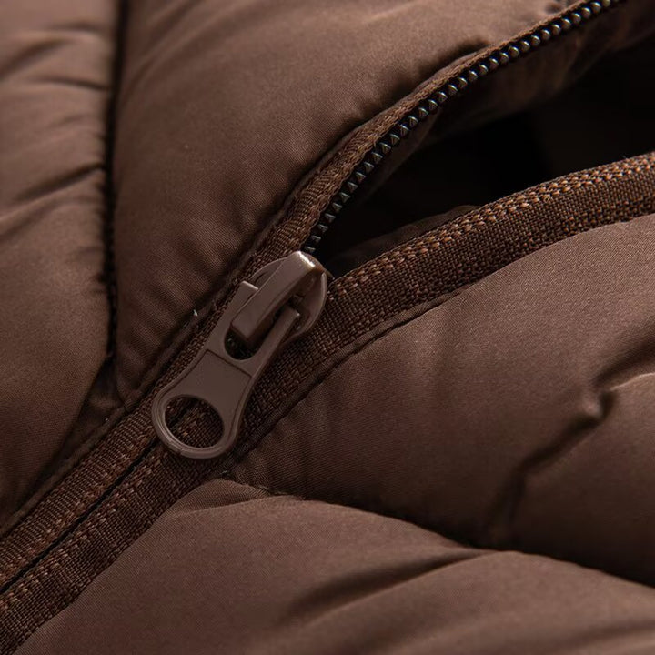 Women's hybrid quilted jacket with padding, hood, and elastic sleeve inserts Mune Fashion